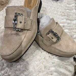 Elegant Charles David snake print mules with Crystal Buckle